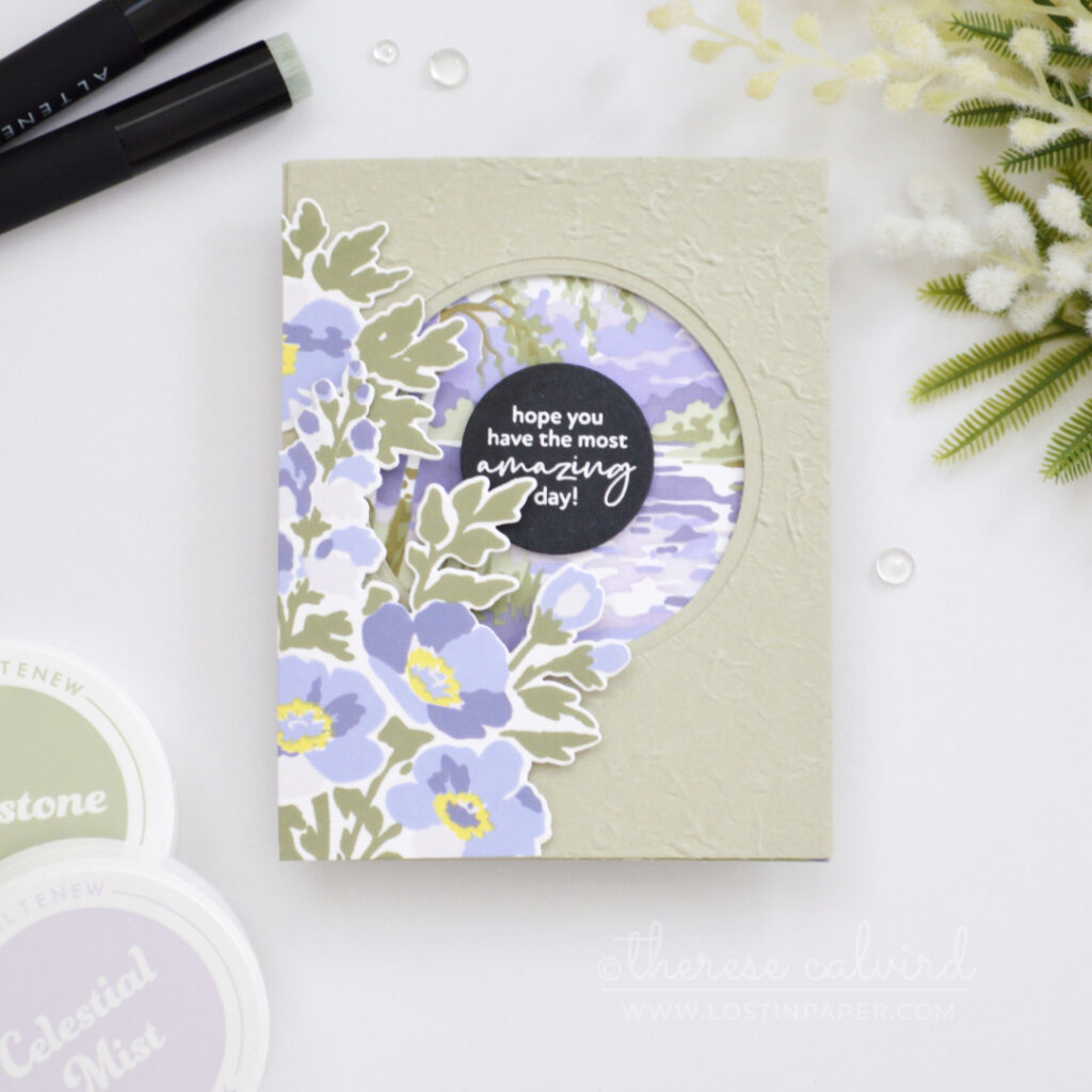 Sage green and purple floral trifold card with an embossed front, circle window, bold sentiment and soft stenciled landscape scene.