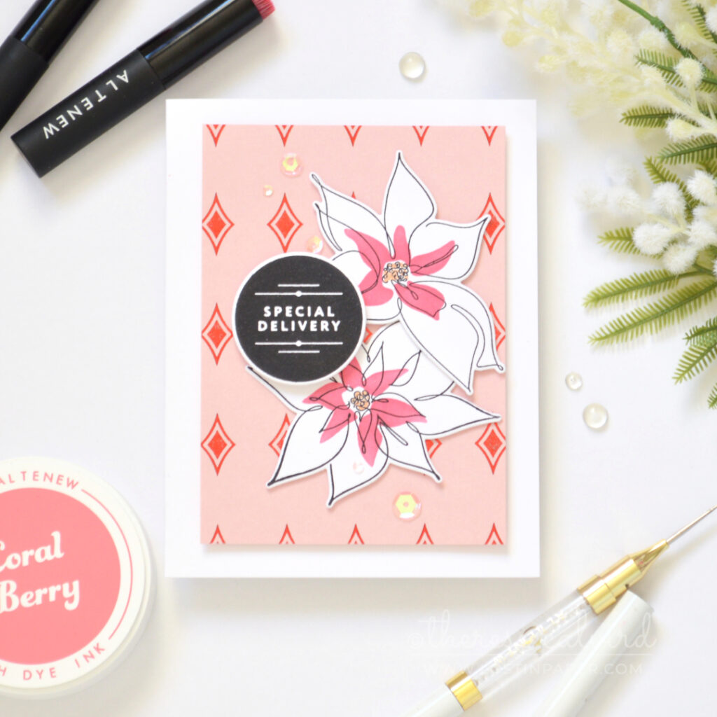 Pink Christmas card with a red hot foiled diamond background and layered bells