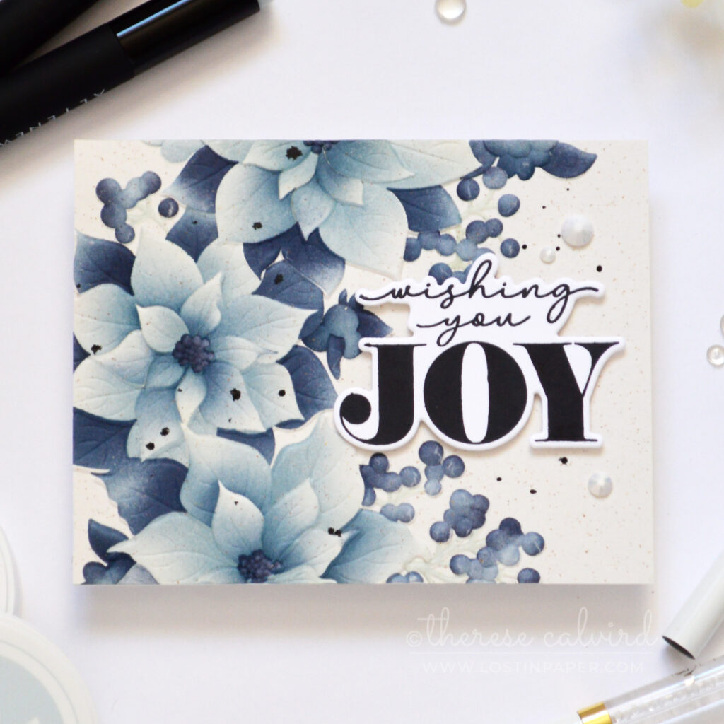 Monochromatic blue-grey poinsettia Christmas card.