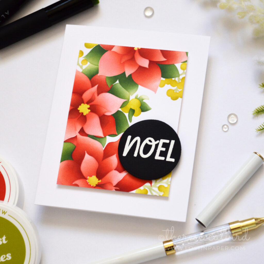Traditional red and green poinsettia Christmas card.