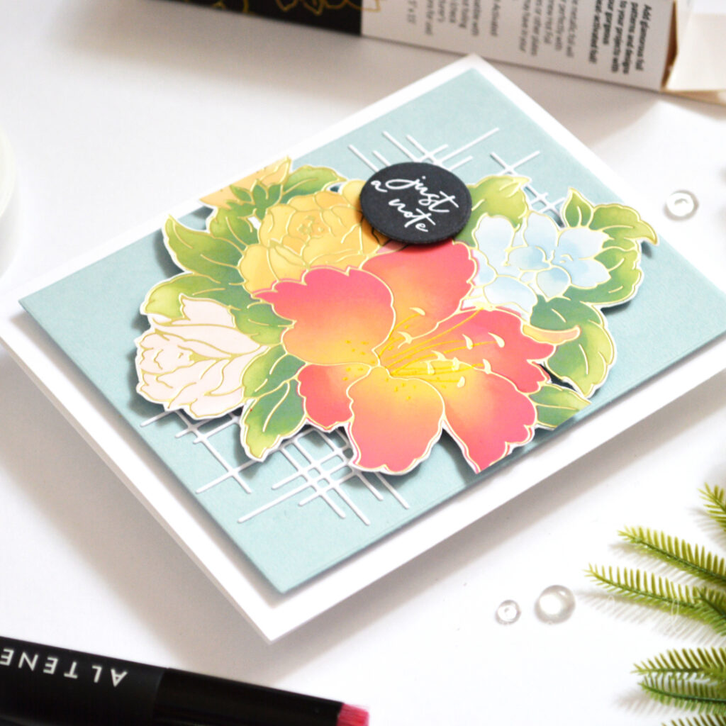 Hot foiled lily bouquet with bright stencil-blended flowers on a pale blue background.